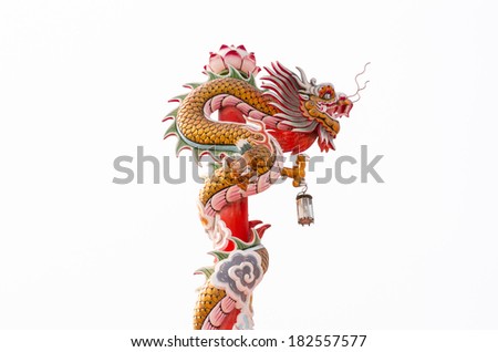 Dragons Masters sides by a Chinese temple statue for Plate lamps. Power to shines light on ancient beliefs.
