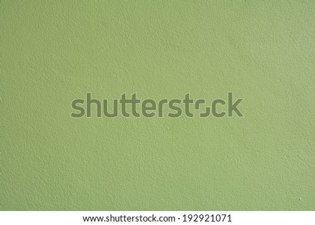 Concrete wall background with beautiful green eyes, clean your home decor both inside AND outside.