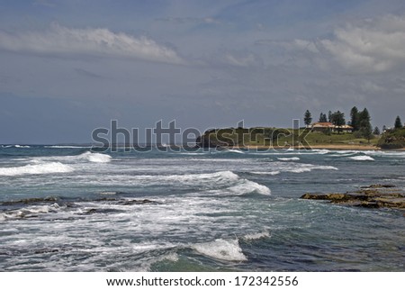 waves roll into the shoreline on Wollongong coastline