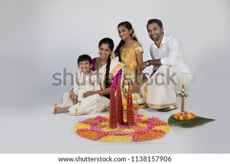 family in traditional kerala dress south indian look