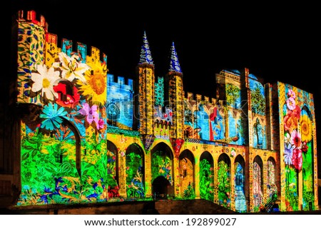 AVIGNON/ FRANCE Ã¢Â?Â? NOVEMBER 29, 2013:  The  walls of the Popes Palace are illuminated during the light performance \