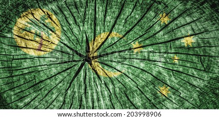 Flag of  Cocos  Islands on cracked wooden texture