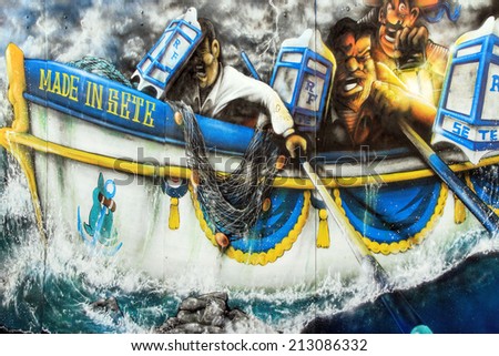 SETE, France - August 23, 2014: Water Jousting graffiti scene on the wall of Sete, south of France on August 23, 2014