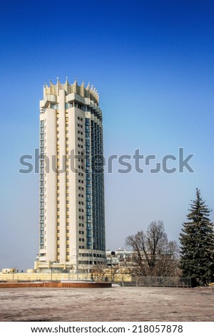 ALMATY, KAZAKHSTAN - FEBRUARY 25, 2014: Kazakhstan Hotel is a famous landmark all over Almaty, and serves as a symbol of the city. Taken on winter day in Almaty, Kazakhstan.