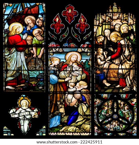 EDINBURGH, SCOTLAND - OCTOBER 02, 2014: Stained glass window illustrated Bible stories in the  St Giles\' Cathedral of Edinburgh, Scotland, UK.