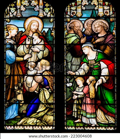 EDINBURGH, SCOTLAND - OCTOBER 02, 2014: Stained glass window illustrated Bible stories in the  St Giles' Cathedral of Edinburgh, Scotland, UK.
