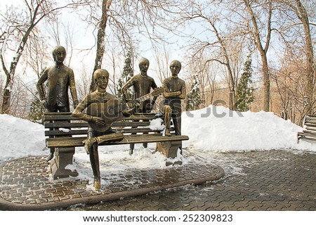 ALMATY, KAZAKHSTAN - MARCH 10, 2014:  bronze statue of The Beatles by sculptor Eduard Kazaryan was placed on Kok Tobe mountain on May 15, 2007.