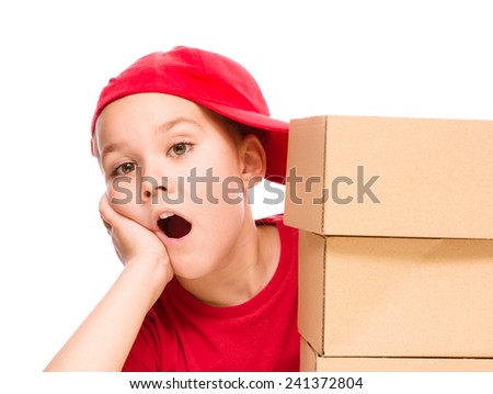 Happy girl holding cardboard boxes, delivery of goods, isolated over white