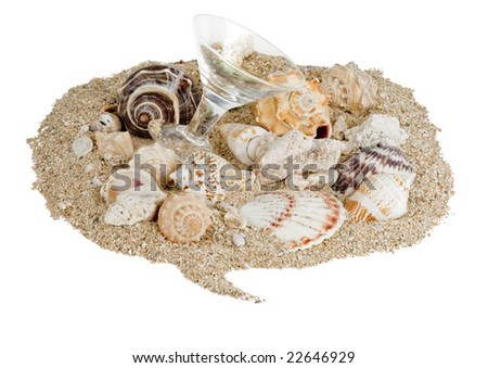 Sand in the shape of a talk bubble with seashells and small martini glass, isolated on white