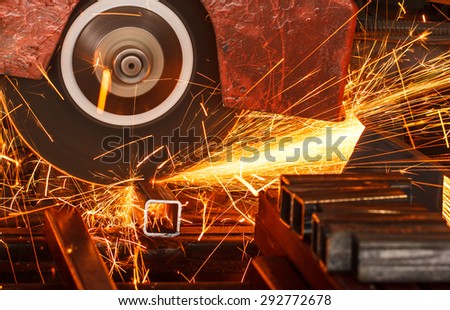 Sparks while cutting steel in the factory.