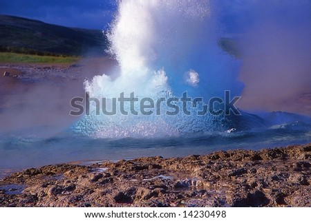 Geyser eruption in Geysir site, Iceland