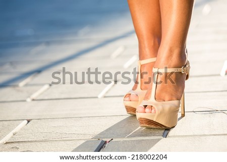 Waist Down of Woman Wearing High Heels