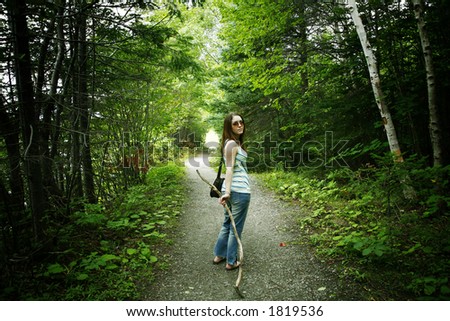 Woman hiking in a beautiful walking trail