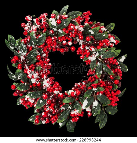 Christmas wreath on the black background