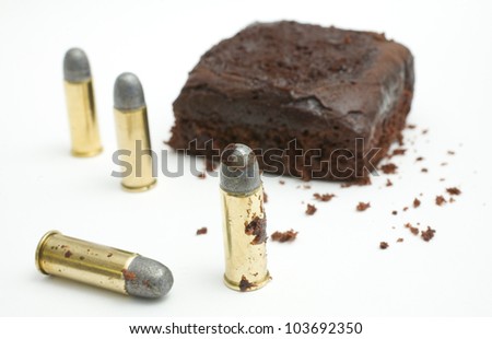 .44 special cartridges with part of cake on the brass on white