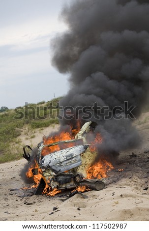 Compact car after C4, gasoline and TNT went off inside