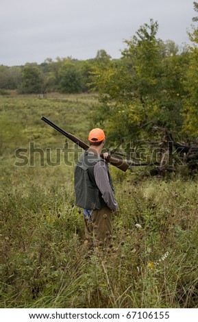upland bird hunter who has stopped for a second