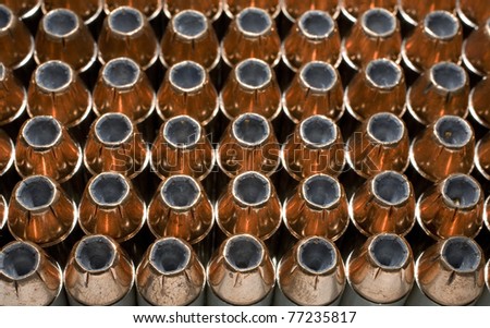 Hollow point bullets with a copper jacket and side lighting