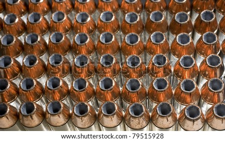 Hollow point bullets with a copper jacket that are backlit