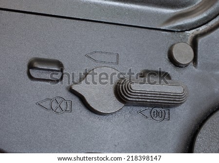 Switch on the side of a rifle that puts the gun on safe