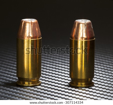 Hollow point bullets on top of cartridges for a forty five caliber handgun