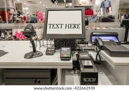 Computers and cash registers in a large store in the mall