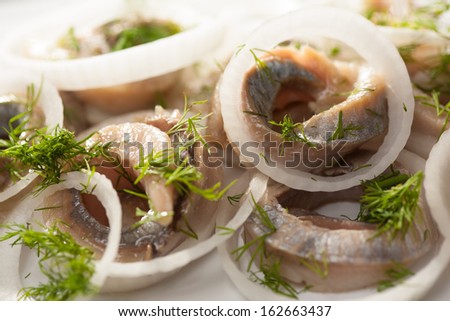 Herring rolls close-up, prepared fish