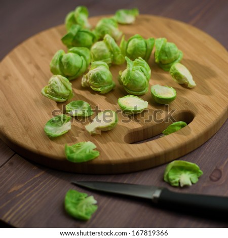 Brussels Sprout on wood cutting board
