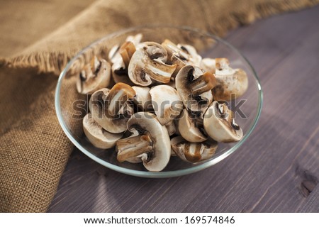 Mushrooms chopped glass bowl