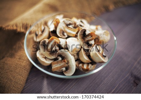 Mushrooms chopped glass bowl