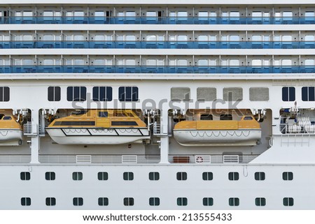 Cabin balconies and Lifeboats of a modern cruise ship