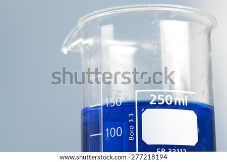 250ml measuring beaker with blue liquid