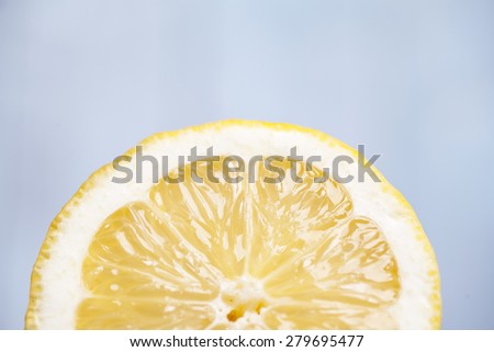 Close up of a juicy lemon cut in half