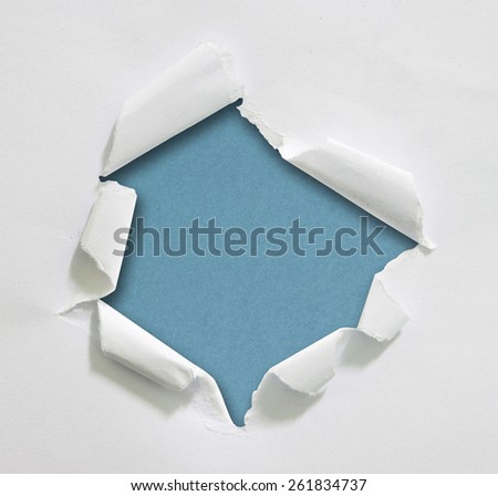Hole ripped in paper
