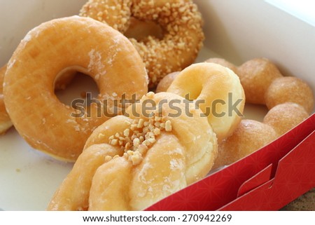 Set of delicious donut in paper box