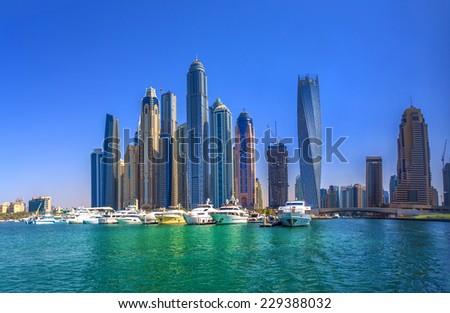 DUBAI, UAE - OCTOBER 18: Modern buildings in Dubai Marina, Dubai, UAE. In the city of artificial channel length of 3 kilometers along the Persian Gulf, taken on 18 October 2014 in Dubai.