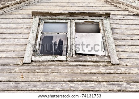 Scary dark window in old haunted house