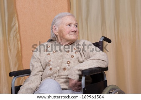 Eighty year old woman sitting in a wheelchair