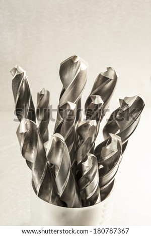 Metal drill bits. Drilling and milling industry. Closeup.