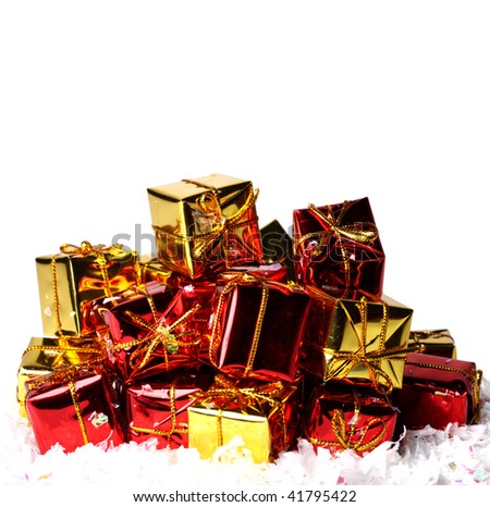 Heap of gifts on artificial snow isolated on white