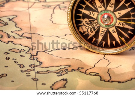 Compass on old contoured map, shallow DOF