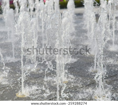 closeup stop motion fountain water in the garden