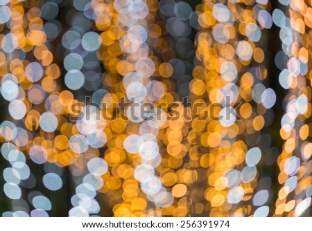 defocused white and gold circle light background