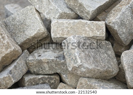 a bunch of cobblestones at a building site