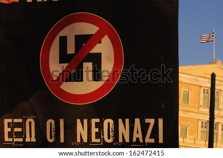 Athens, Greece - September 26. A Banner In Greek Reading, &Quot;Out The New Nazi&Quot; In Front Of The Greek Parliament During A Protest Against Far-Right Golden Dawn Party, In Athens, Sept. 25, 2013.