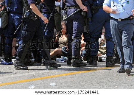 ATHENS, GREECE-April 20. Riot police arresting demonstrator, in central Athens, April 20, 2010.