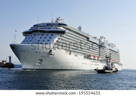 PIRAEUS, GREECE -MAY 27, 2014 Regal Princess, Royal class cruise ship owned by Princess Cruises, departs from Piraeus port. Ship was built in 2014 and has a capacity of 3560 passengers and 1346 crew.