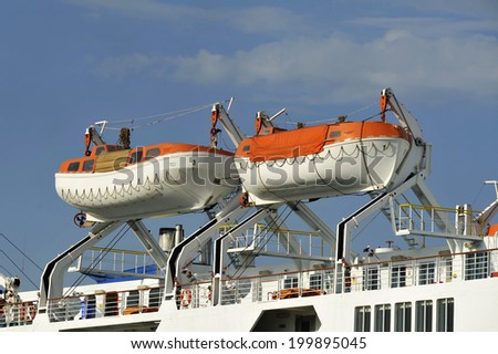 PIRAEUS, GREECE -June 8, 2014.  Safety lifeboats of passengers - car ship KRITI II. Ship built: 1979, passengers 1.600,  length 192 m.
