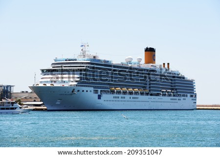 Piraeus, Greece - August 26, 2013.:Costa Delizioca is a cruise ship by Costa Crociere. Built in 2010,Tonnage 92,700 GT, Length 294 m, Decks 16,Passengers 2,828 and Crew 1,100.