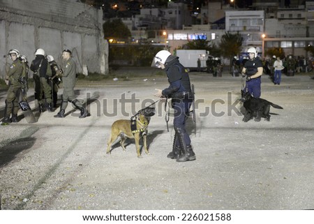 Piraeus, Greece Oct. 22, 2014. Security measures with police dogs outside the Karaiskakis Stadium before the champions league mach Olympiacos vs Juventus.